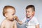 Two little boys using stethoscope. Children playing doctor and patient. Check the heartbeat.