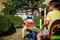 Two little brother toddlers playing with swing balancer