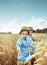 Two little brothers in the wheat field
