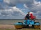 Two little children on a catamaran observing nature