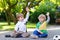 Two little fan boys at public viewing of football game