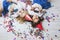 Two little girls child fashion colorful confetti on the floor an