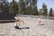 Two little girls fun with colorful flying kite