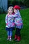 Two little girls huges outdoor