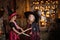 Two little girls laughing witch on a broomstick. childhood Halloween