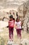 Two little Girls posing next to Ruins of Old Church.July 22,2017 in Selime,Aksaray,Turkey.