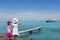 Two little girls tourist in turquoise beach