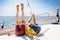 Two little kid boys, best friends enjoying sailing boat trip. Family vacations on ocean or sea on sunny day. Children