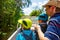 Two little kids boys and father making air boat tour in Everglades Park