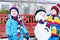 Two little siblings boys making a snowman, playing and having fun with snow