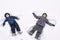 Two little siblings kid boys in colorful winter clothes making s