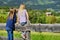 Two little sisters admiring beautiful landscape in Dolomites mountain range, South Tyrol province of Italy