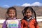 Two little tibetan girls in a school