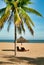 Two lonely loungers on the deserted beach of Hainan Island.