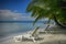 Two lounging chairs on beach