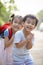 Two lovely asian children boy and girl with kidding smiling face