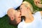 Two Lovely Man Woman Caucasian Kissing On Grass