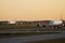 Two Lufthansa airplanes taxiing, Airbus A380 and a small aircraft