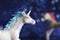 Two magical unicorn on a blue backgroun