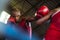 Two male athletes fight in boxing ring