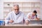 Two male chemists working at the lab