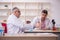 Two male chemists working at the lab