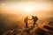 Two male hikers helping each other climb up a mountain, to show teamwork and perseverance