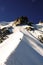 Two male mountain climbers on an exposed ridge in the French Alps near Chamonix