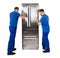 Two Male Movers Placing The Refrigerator