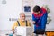 Two male repairmen working at workshop