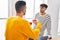 Two man business workers drinking coffee at office