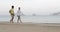 Two Man Walking Along Beach Talking, Gay Couple Communication Tourists On Sea