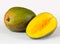 Two mangoes on white background