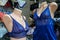 Two mannequins dressed in beautiful blue lace women`s underwear in a lingerie boutique
