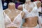 Two mannequins dressed in beautiful white lace women`s underwear in a lingerie shop