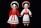 two martenitsa dolls in traditional russian clothing