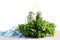 Two mason jars of green smoothies from herbs and vegetable, isolated on a white background. Dieting and fitness concept.