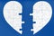 Two matching halves of one heart on trendy blue. Care, health, support, love concept. Separation, divorce, broken heart, break up