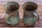 Two Matching Rustic Clay Mugs on a Old Barn Board Floor