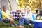 Two Mature Women Relaxing On Camping Holiday