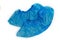 Two medical blue shoe covers overshoes on white background