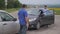 Two men arguing conflict after a car accident on the road car insurance. slow motion video. Two Drivers man Arguing