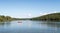 Two men in canoe fishing Lake Taghkanic New York Summer