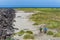 Two men going fishing along Columbia`s South Jetty