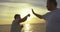 Two men having boxing workout on the beach at