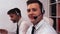 Two men with headsets talking on voice call centre