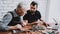 Two Men Repairing Hardware Equipment from PC.