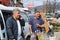 Two men sell homemade quince brandy on Pirot farmers market