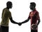 Two men soccer player handshake handshaking silhouette