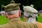 Two men watching highland games